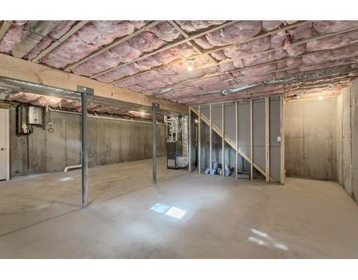 80 Whipple Road Billerica, MA 01821 - Photo 18 of 19 a view of an empty room with wooden floor
