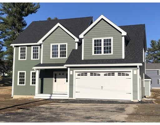 80 Whipple Road Billerica, MA 01821 - Photo 2 of 19 a front view of a house with a yard