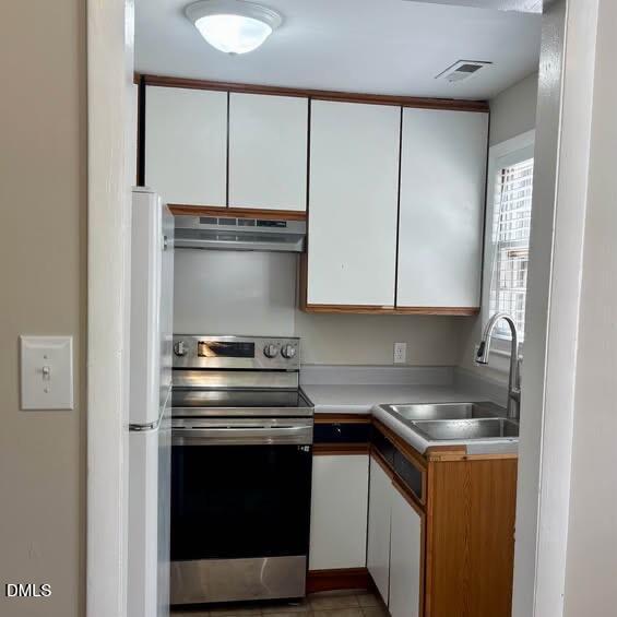 1505 Old Ivey Road Apex, NC 27523 - Photo 10 of 10 a kitchen with a stove and a microwave