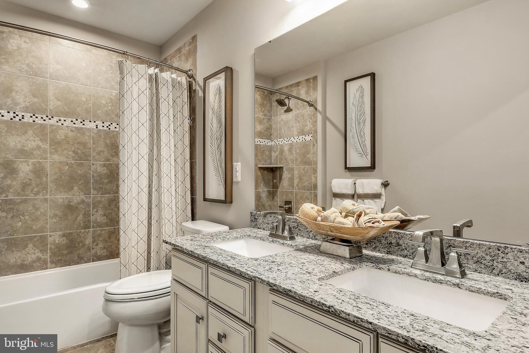 3904 Emory Ridge Road Brandywine, MD 20613 - Photo 18 of 21 HALL BATHROOM W/DOUBLE VANITIES