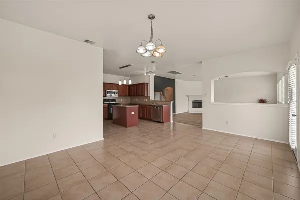 a kitchen with appliances and cabinets