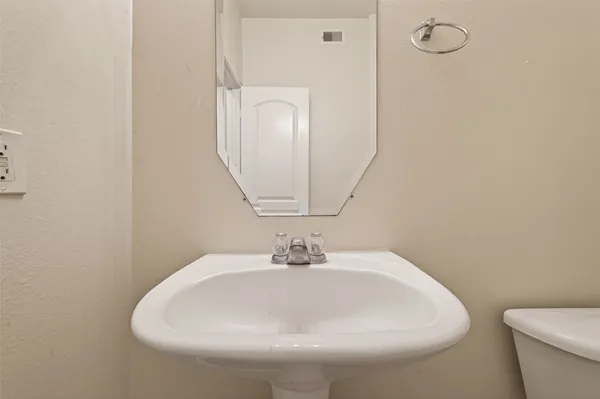 a white bath tub sitting next to a window