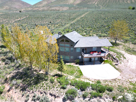 1940 East Shore Road St. Charles, ID 83272 - Photo 44 of 64 Overview of rural landscape featuring a mountain backdrop