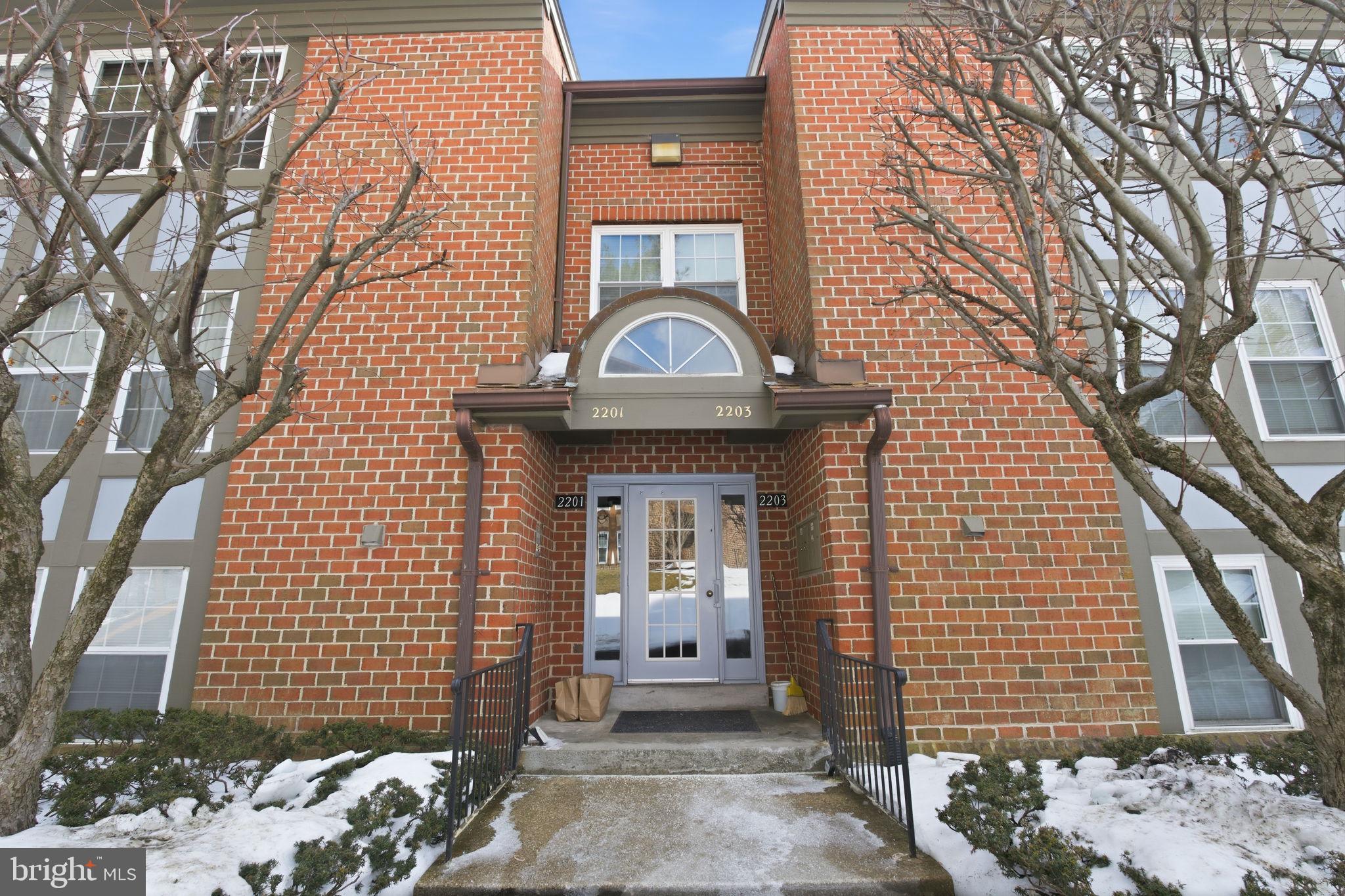 2201 Woodbox Lane, Unit 2201A Baltimore, MD 21209 - Photo 1 of 21 a front view of a house