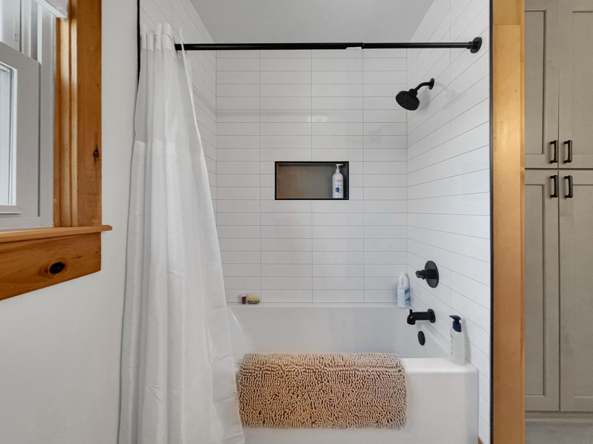 1706 Benders Ferry Road Mount Juliet, TN 37122 - Photo 33 of 79 a bathroom with a shower and a bath tub
