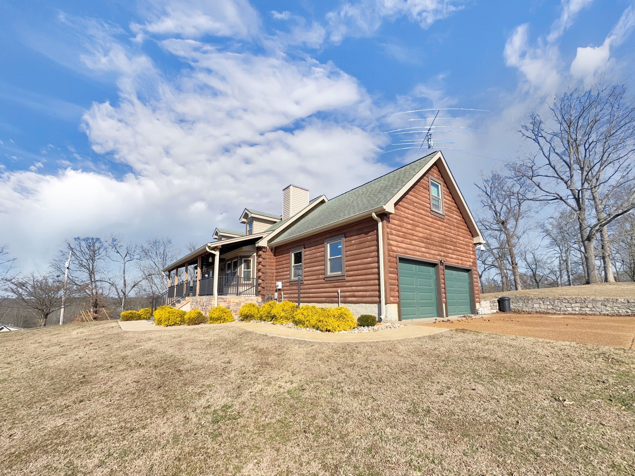 1706 Benders Ferry Road Mount Juliet, TN 37122 - Photo 5 of 79 a view of a house with a yard covered in snow