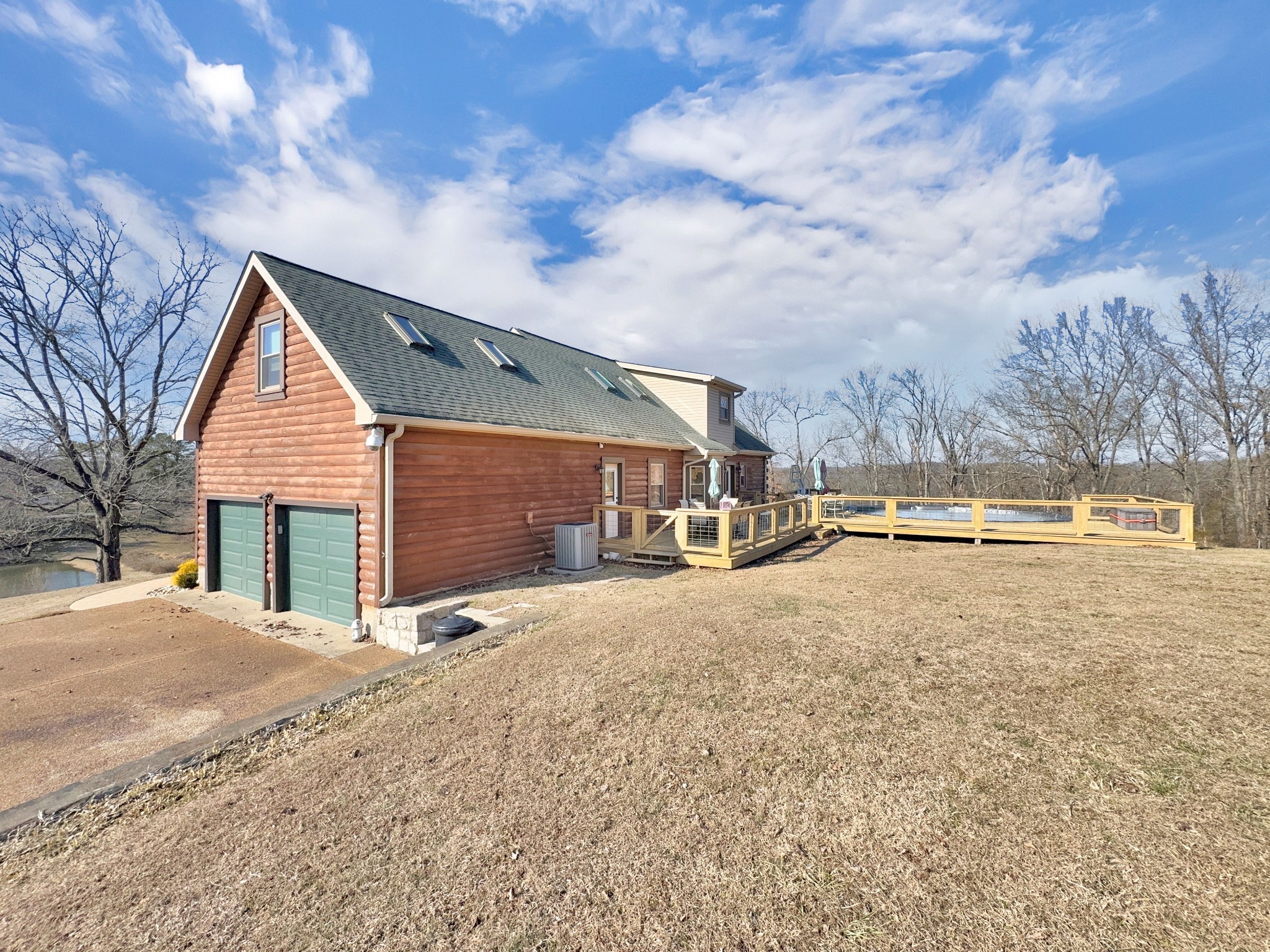 1706 Benders Ferry Road Mount Juliet, TN 37122 - Photo 6 of 79 a backyard of a house with table and chairs