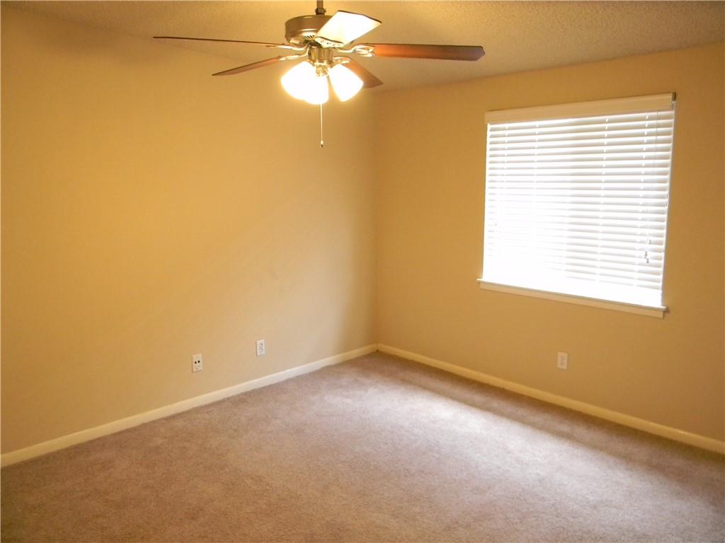 2408 Longview Street, Unit 210 Austin, TX 78705 - Photo 6 of 8 an empty room with a window