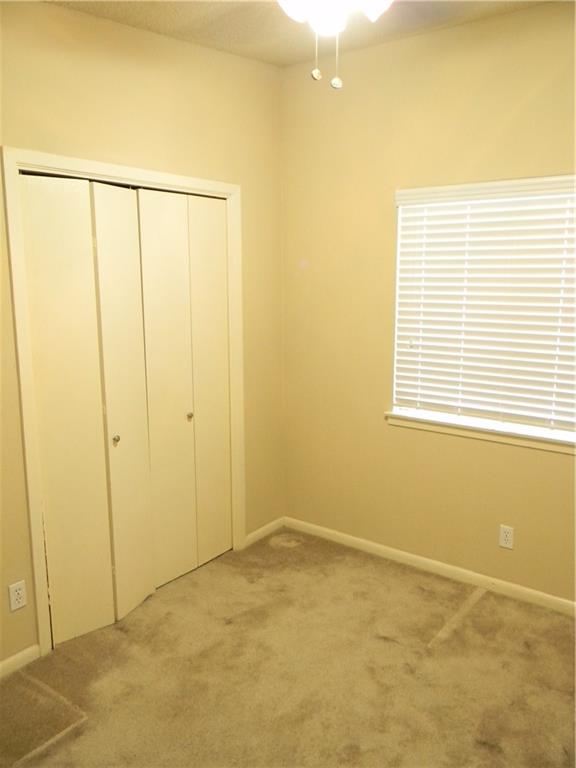 2408 Longview Street, Unit 210 Austin, TX 78705 - Photo 8 of 8 a view of an empty room with a window