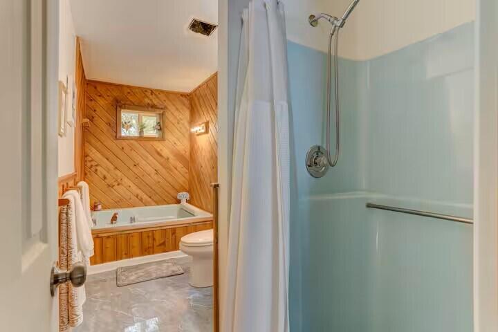 2255 Scarborough Way Bushkill, PA 18324 - Photo 23 of 24 a bathroom with a tub and shower