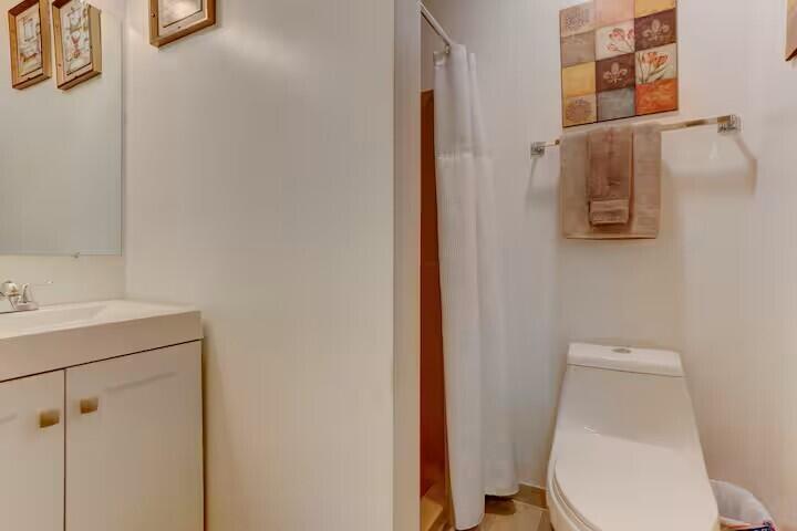 2255 Scarborough Way Bushkill, PA 18324 - Photo 24 of 24 a white toilet sitting next to a bathroom sink