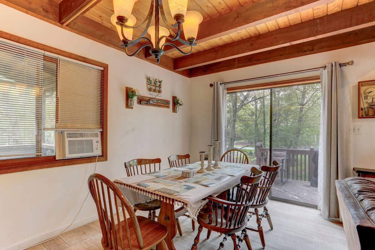 2255 Scarborough Way Bushkill, PA 18324 - Photo 7 of 24 a view of a dining room with furniture window and outside view
