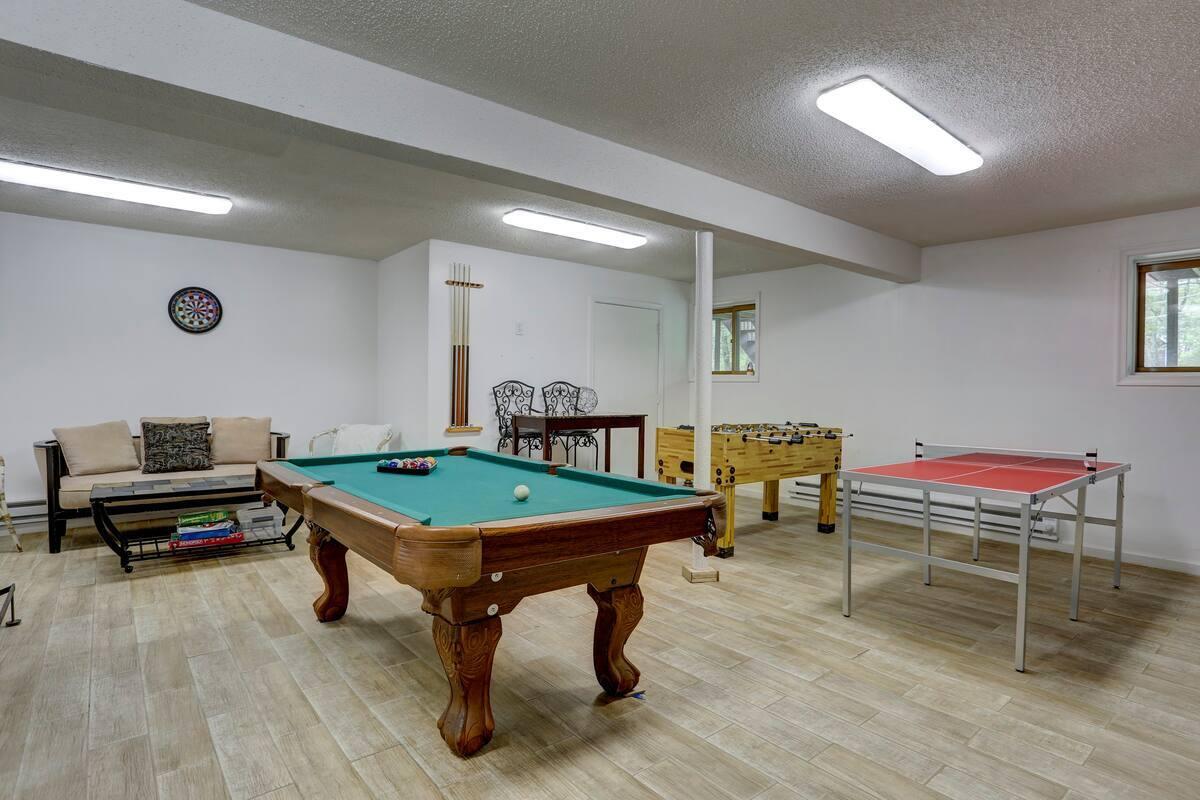 2255 Scarborough Way Bushkill, PA 18324 - Photo 9 of 24 a room with furniture pool table wooden floor and windows