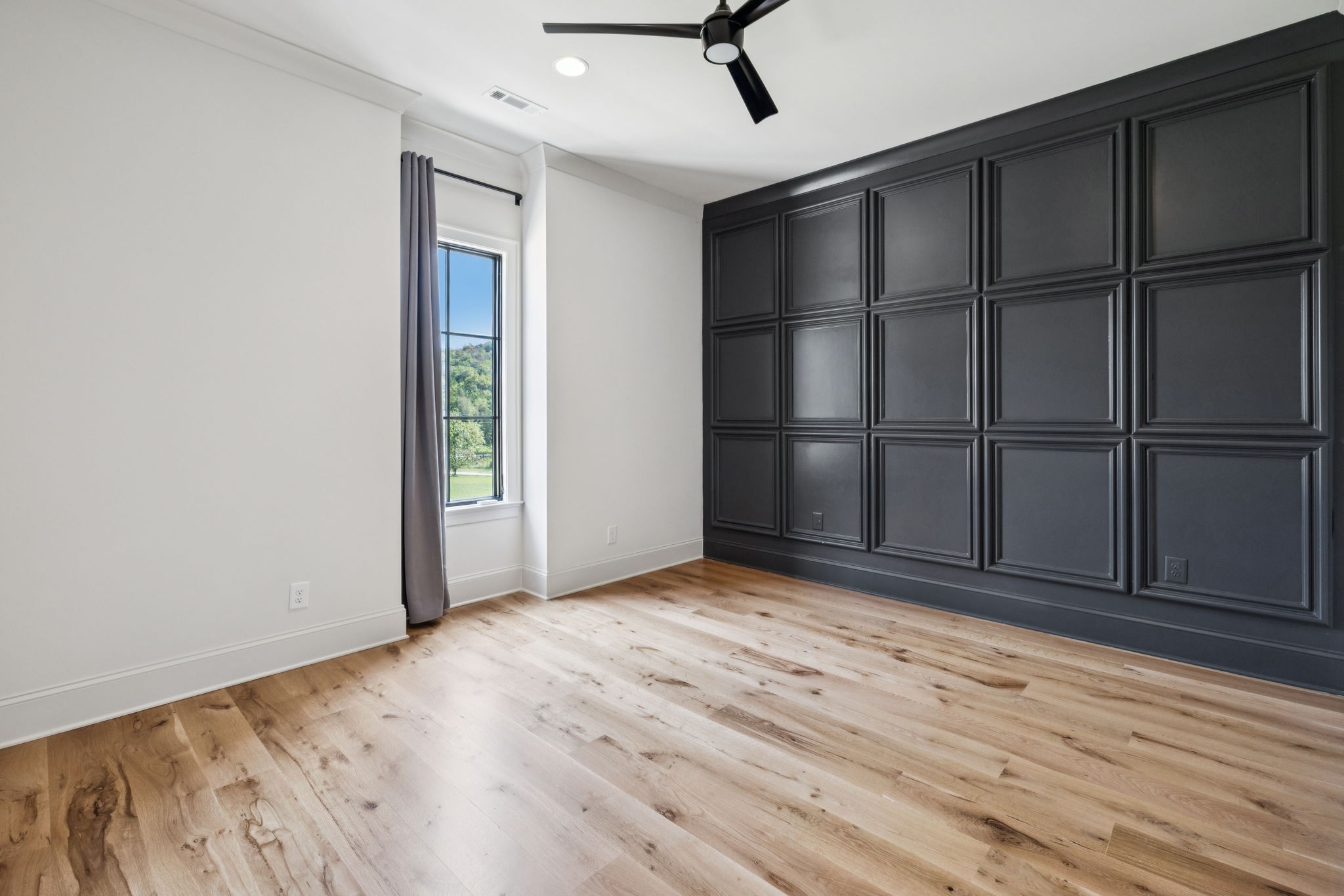 2245 Skinner Road Arrington, TN 37014 - Photo 56 of 98 an empty room with wooden floor