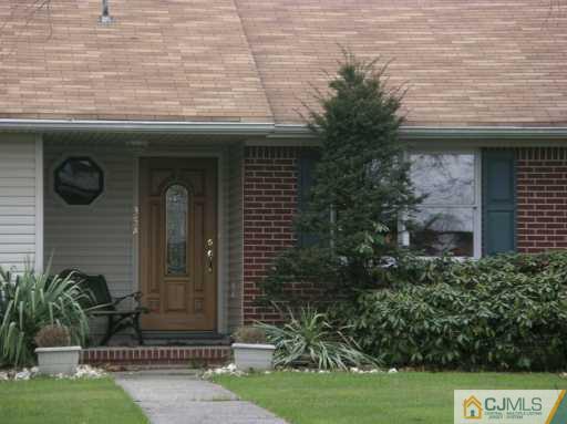 354 Old Post Road Edison, NJ 08817 - Photo 8 of 8 a front view of a house with a yard
