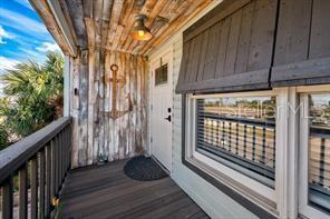 6728 Sea Ranch Drive Hudson, FL 34667 - Photo 3 of 69 a view of a house with a door and wooden floor