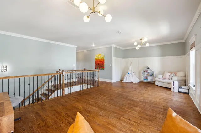 a view of a bedroom with a bed