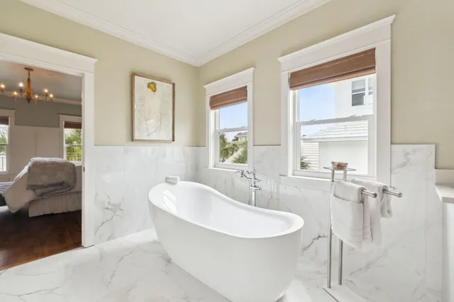 a bathroom with a bathtub and a sink