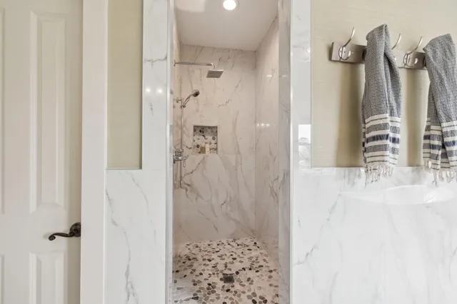 a view of a room with racks on the wall