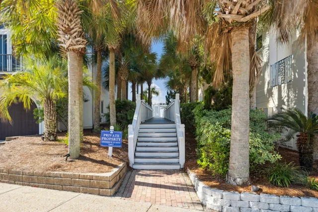 a view of a balcony with wooden floor