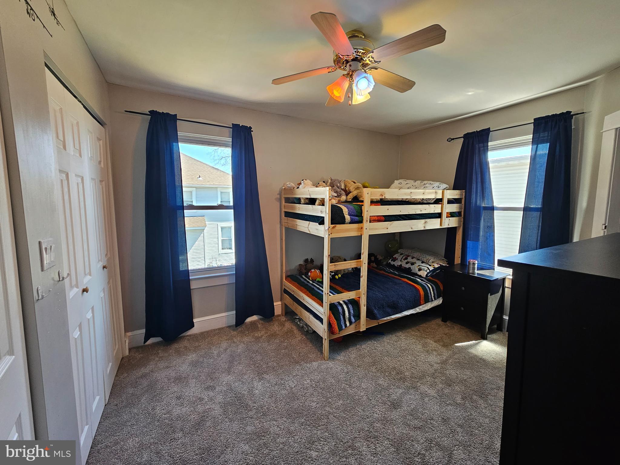 303 Delaware Avenue Riverside, NJ 08075 - Photo 20 of 30 a bedroom with a bed and a window