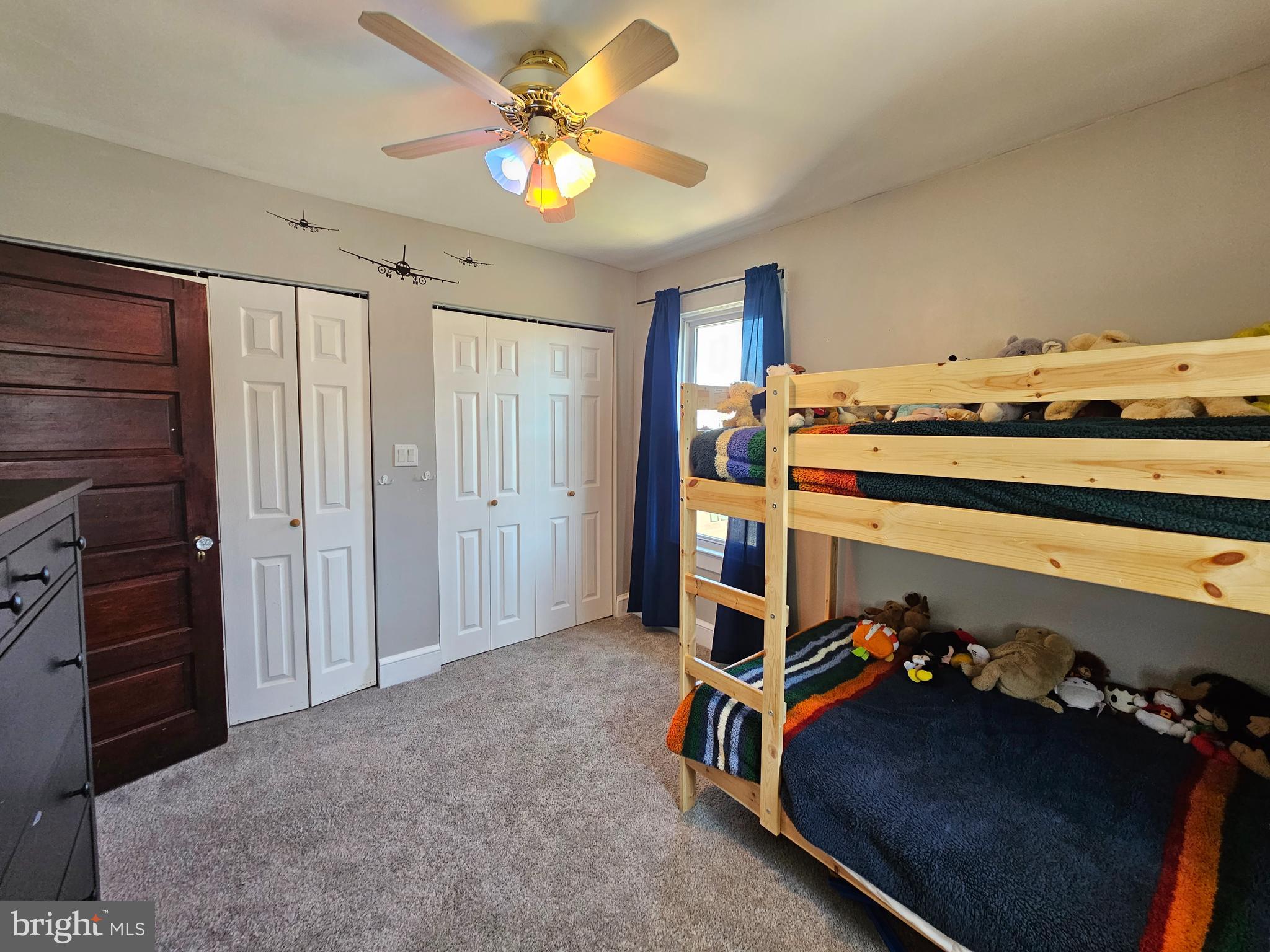 303 Delaware Avenue Riverside, NJ 08075 - Photo 21 of 30 a view of a room with closet dryer and chandelier