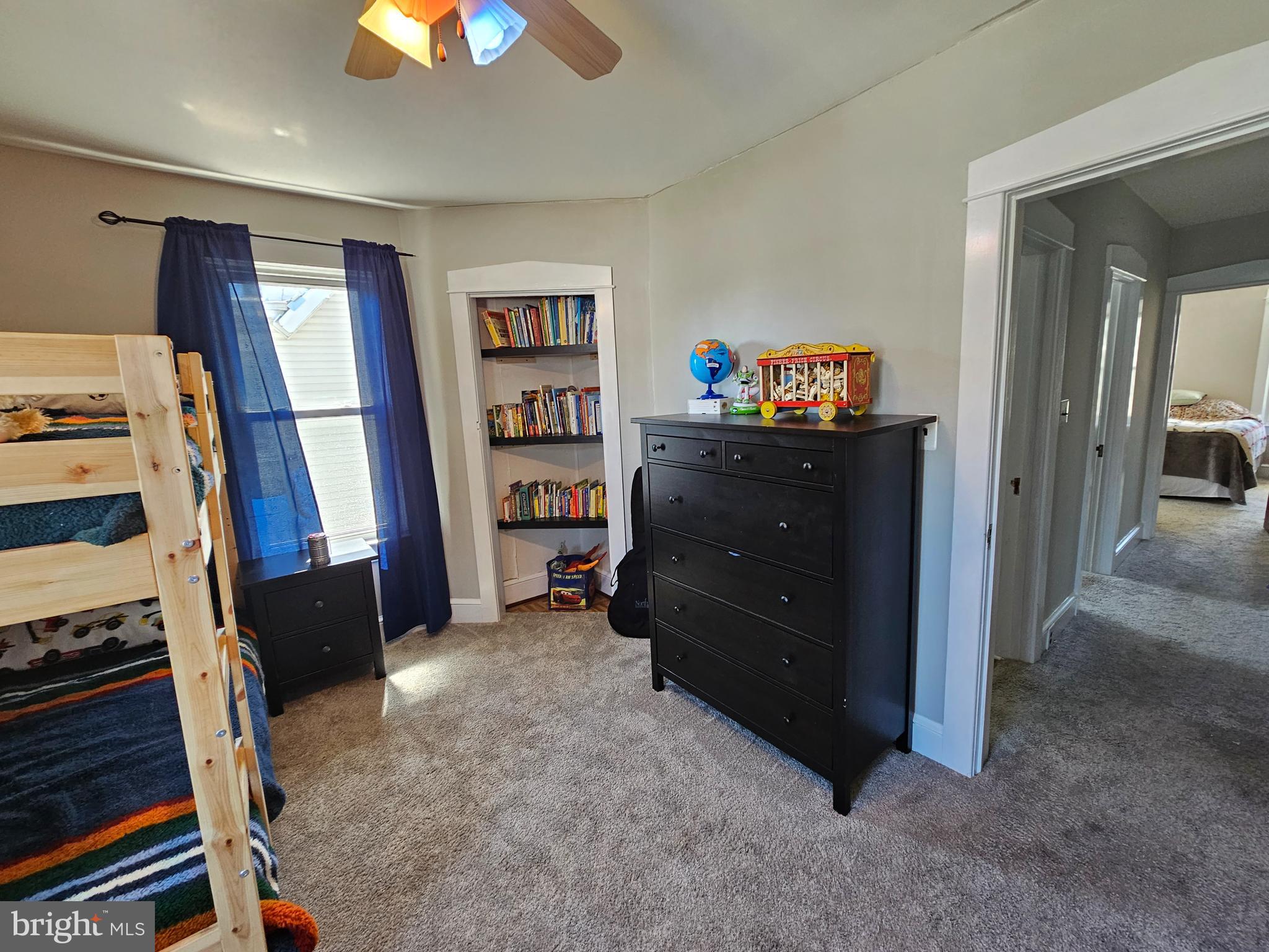 303 Delaware Avenue Riverside, NJ 08075 - Photo 22 of 30 a bed room with a bed and a television