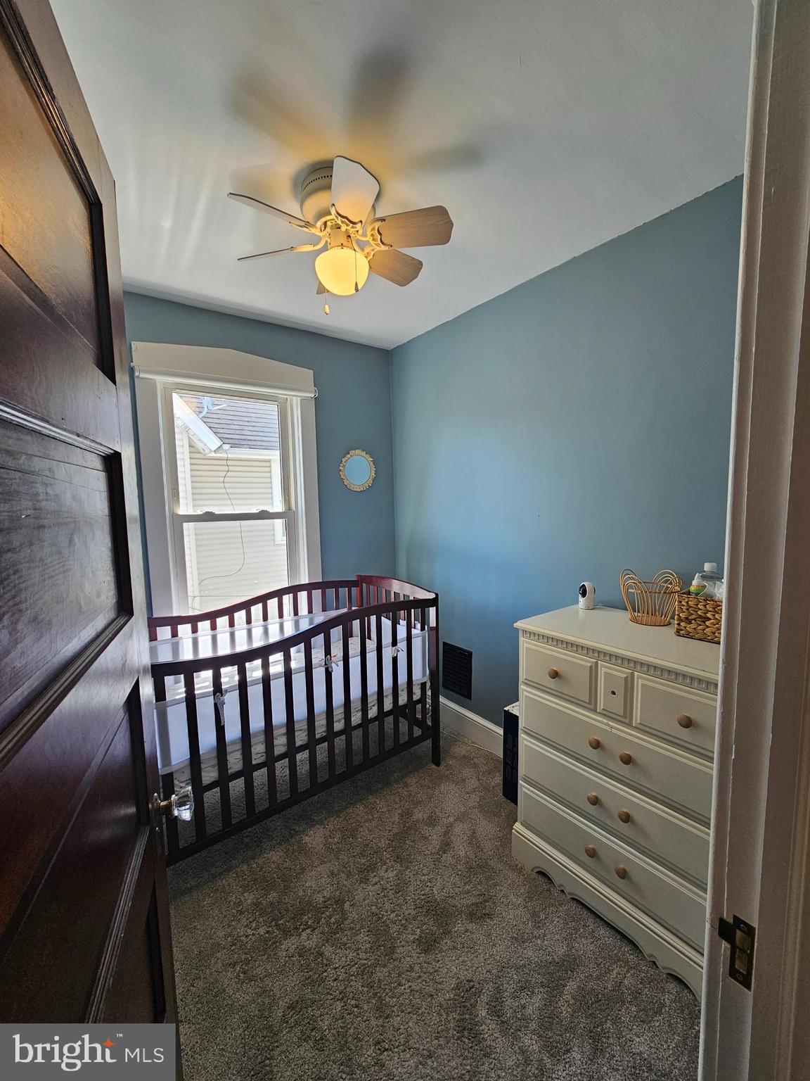 303 Delaware Avenue Riverside, NJ 08075 - Photo 23 of 30 a bedroom with a bed and a window