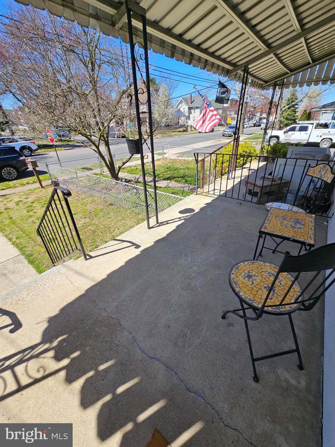 303 Delaware Avenue Riverside, NJ 08075 - Photo 5 of 30 a view of a chairs and table in patio