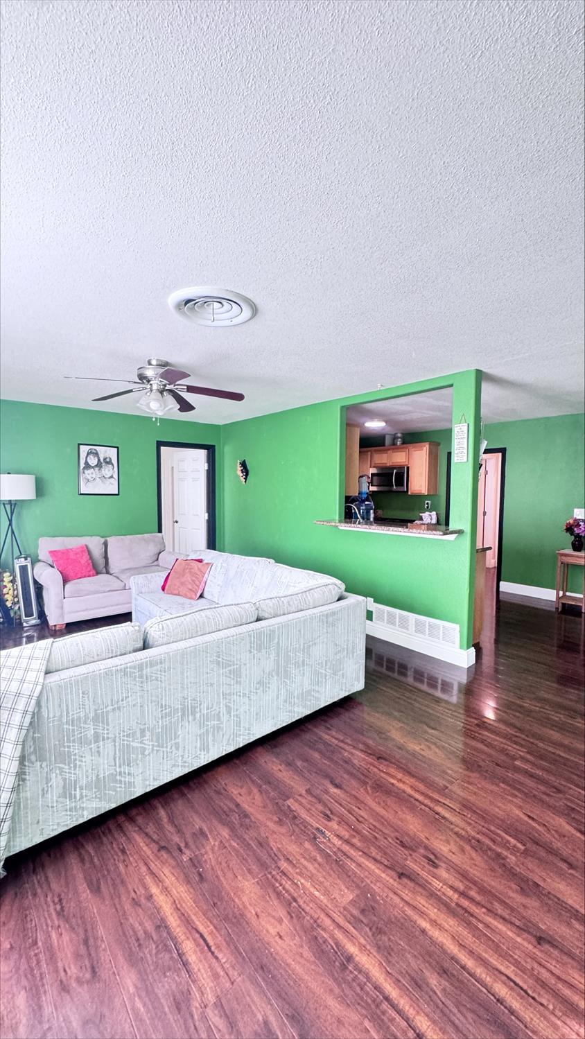 410 Sage Street Gridley, CA 95948 - Photo 5 of 43 a bedroom with a bed and a view of kitchen