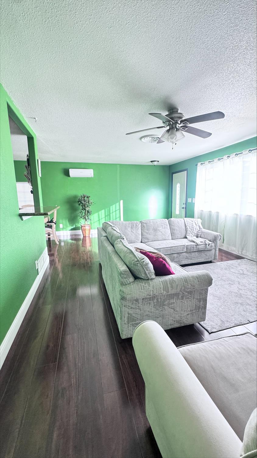 410 Sage Street Gridley, CA 95948 - Photo 7 of 43 a living room with furniture and a large window