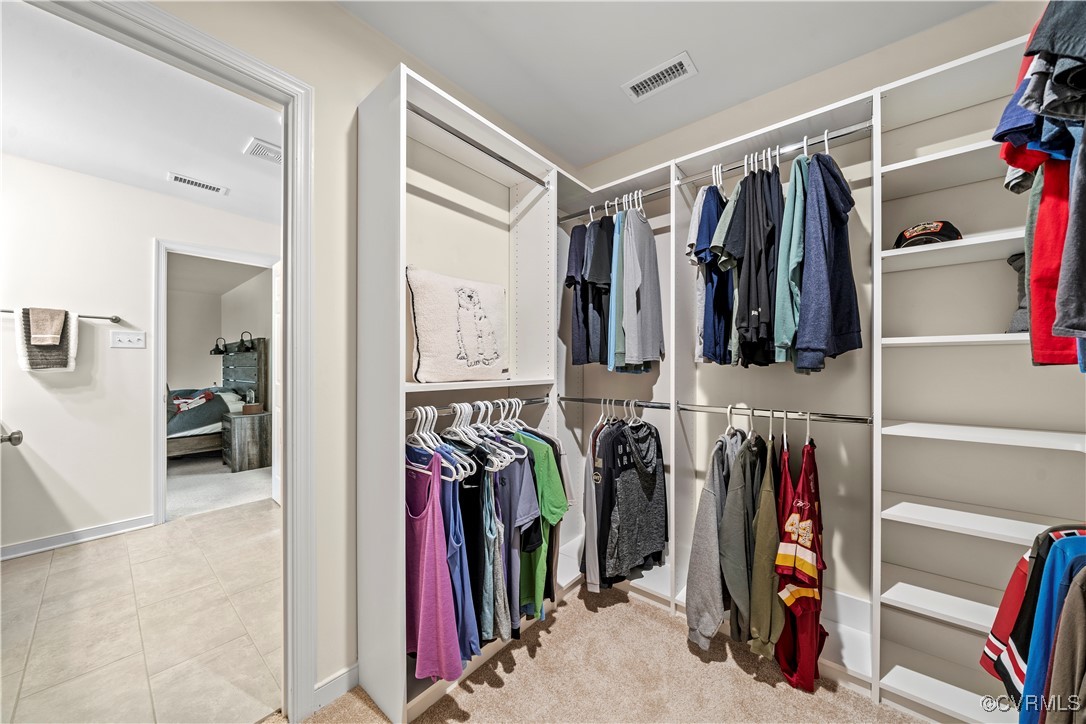 2829 Preston Park Way Sandy Hook, VA 23153 - Photo 22 of 36 a view of walk in closet with clothes