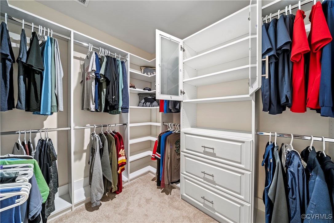 2829 Preston Park Way Sandy Hook, VA 23153 - Photo 23 of 36 a view of walk in closet with clothes and shoes