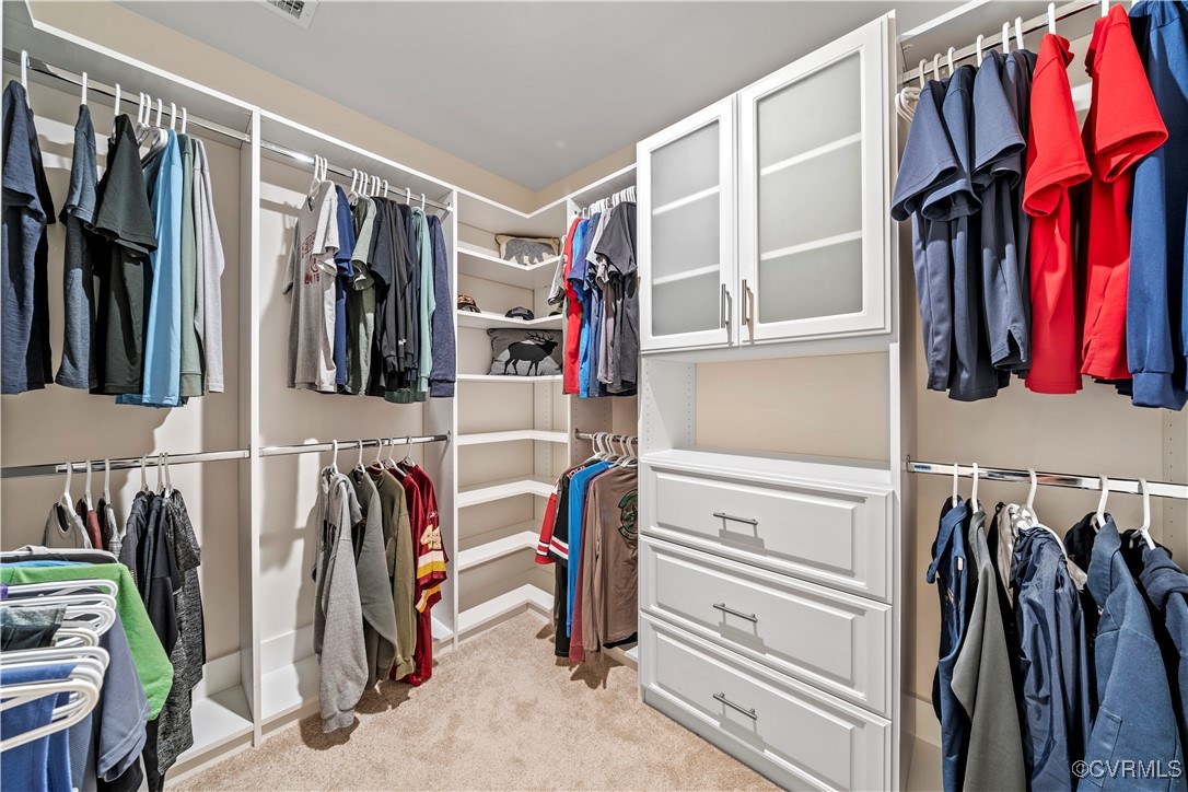 2829 Preston Park Way Sandy Hook, VA 23153 - Photo 24 of 36 a view of walk in closet with clothes and shoes