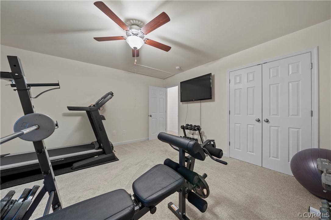 2829 Preston Park Way Sandy Hook, VA 23153 - Photo 26 of 36 a room with gym equipment and windows