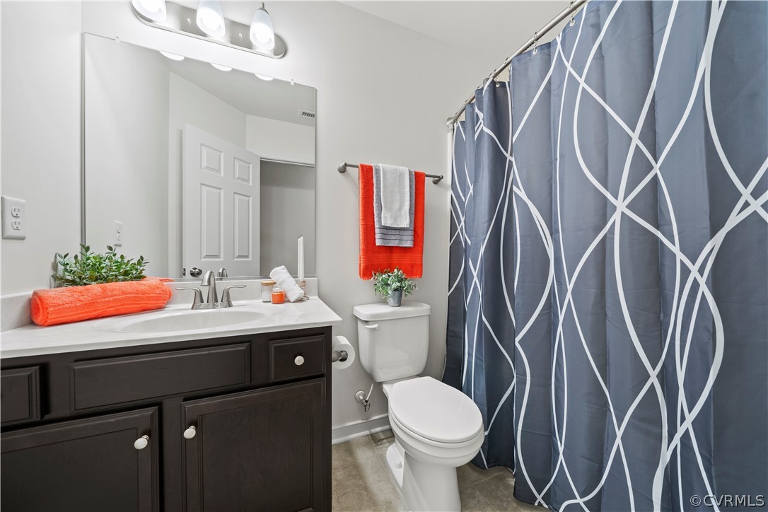 2829 Preston Park Way Sandy Hook, VA 23153 - Photo 27 of 36 a bathroom with a sink toilet and shower