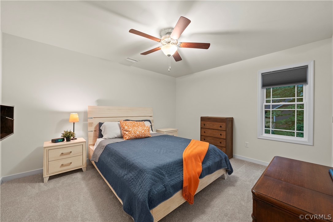 2829 Preston Park Way Sandy Hook, VA 23153 - Photo 30 of 36 a bedroom with a bed and window