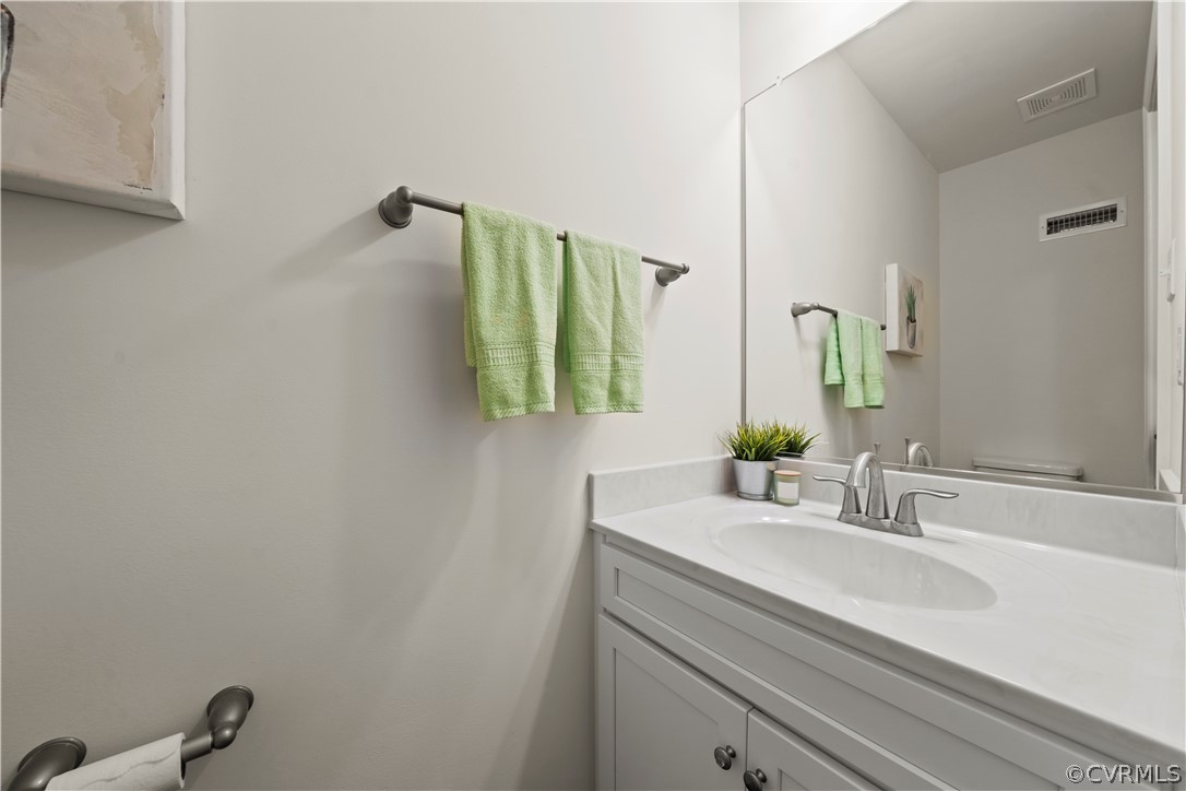 2829 Preston Park Way Sandy Hook, VA 23153 - Photo 33 of 36 a bathroom with a sink and a mirror