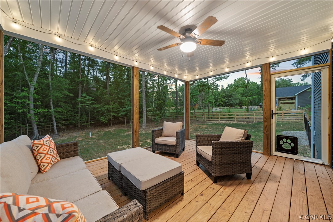 2829 Preston Park Way Sandy Hook, VA 23153 - Photo 6 of 36 a balcony with furniture and a fireplace
