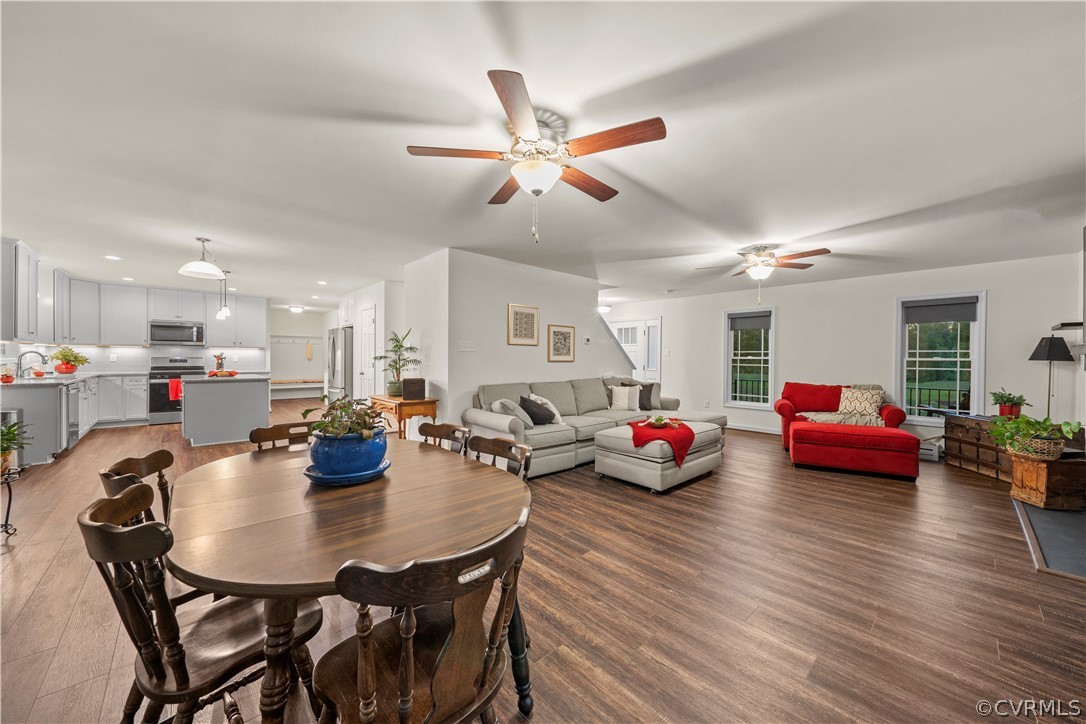 2829 Preston Park Way Sandy Hook, VA 23153 - Photo 9 of 36 a view of a dining room with furniture and wooden floor