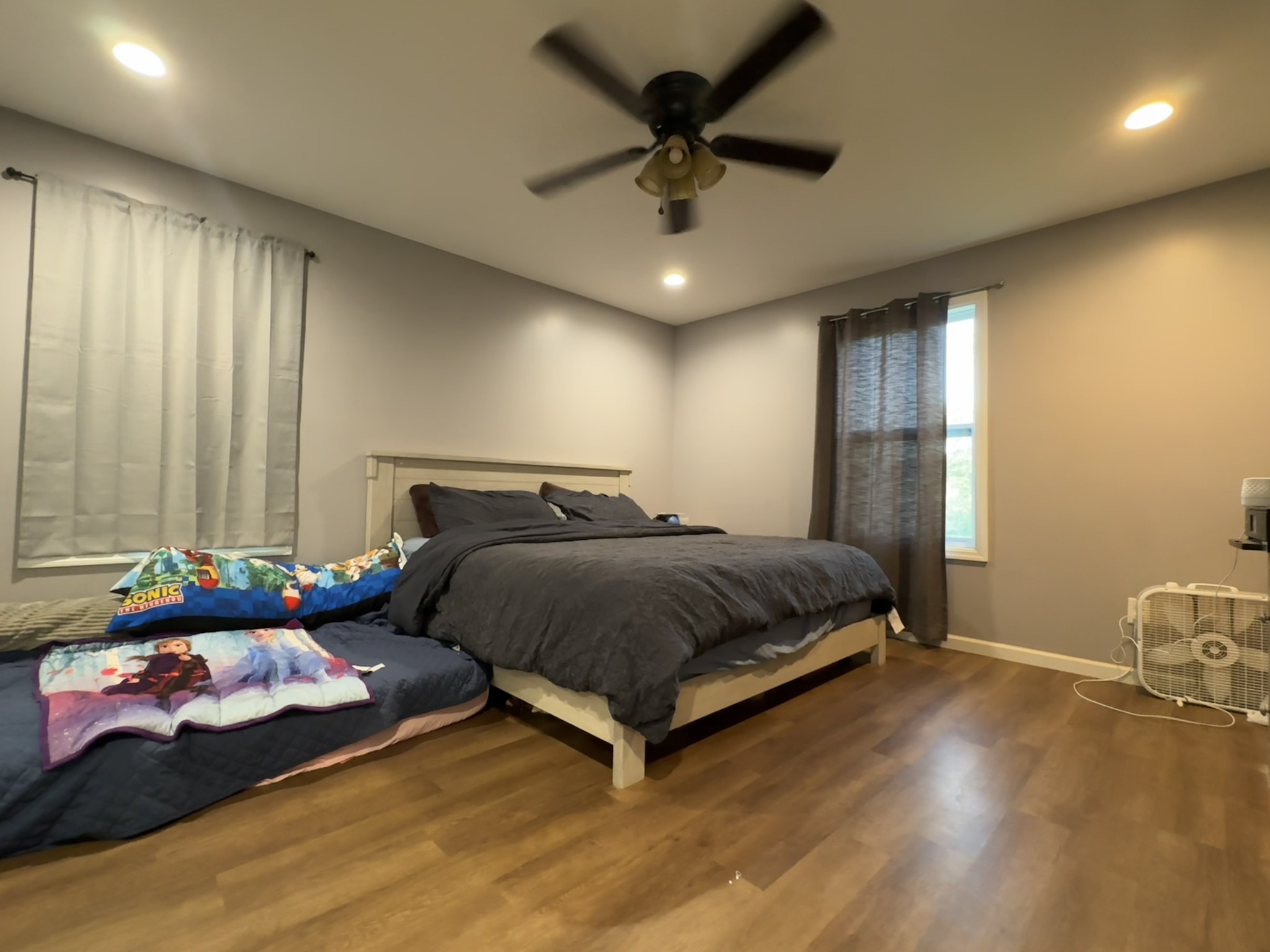 2938 Salmon Branch Road Erin, TN 37061 - Photo 3 of 12 a bedroom with a bed window and a chandelier