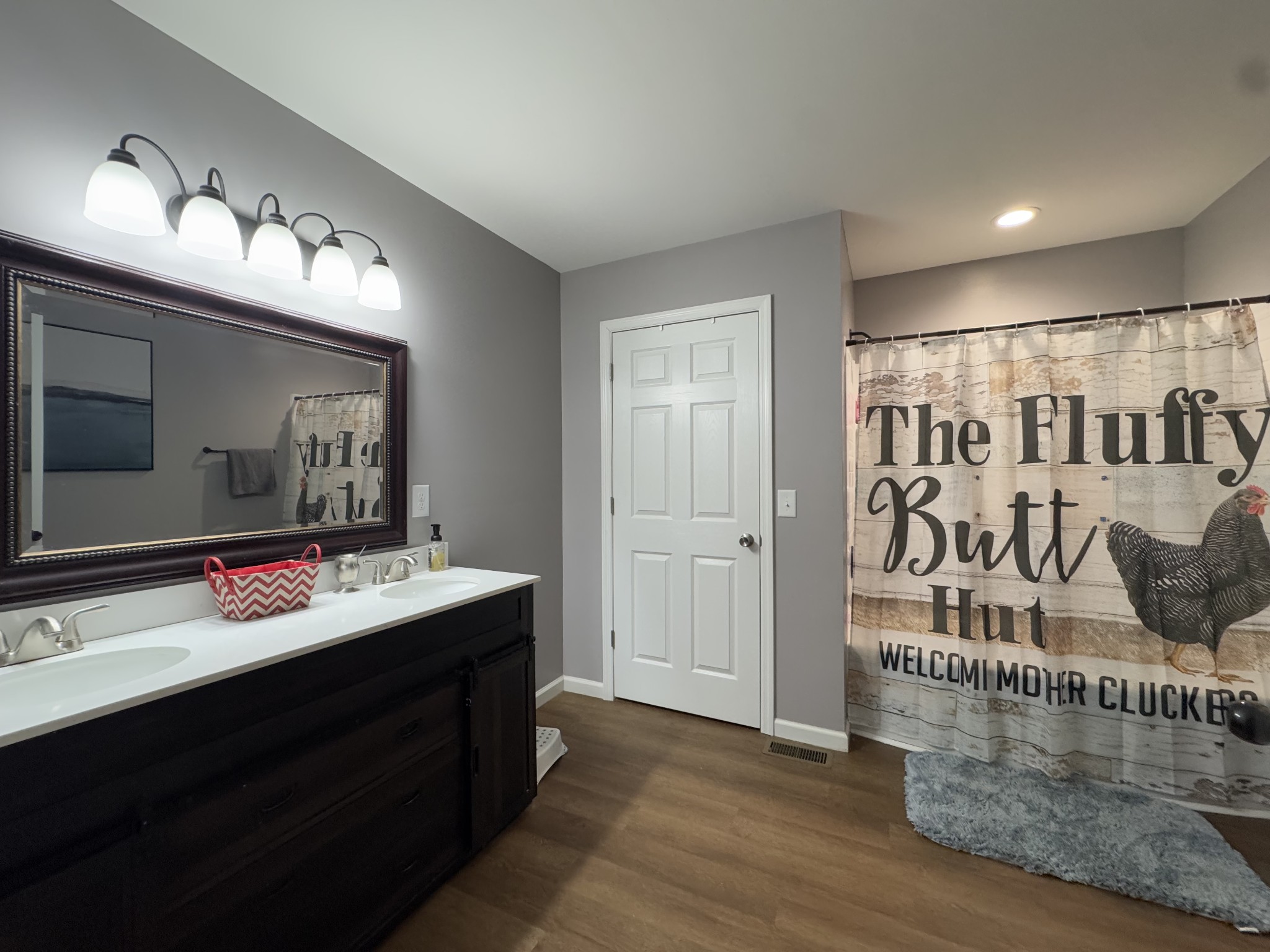 2938 Salmon Branch Road Erin, TN 37061 - Photo 9 of 12 a bathroom with a sink vanity and mirror