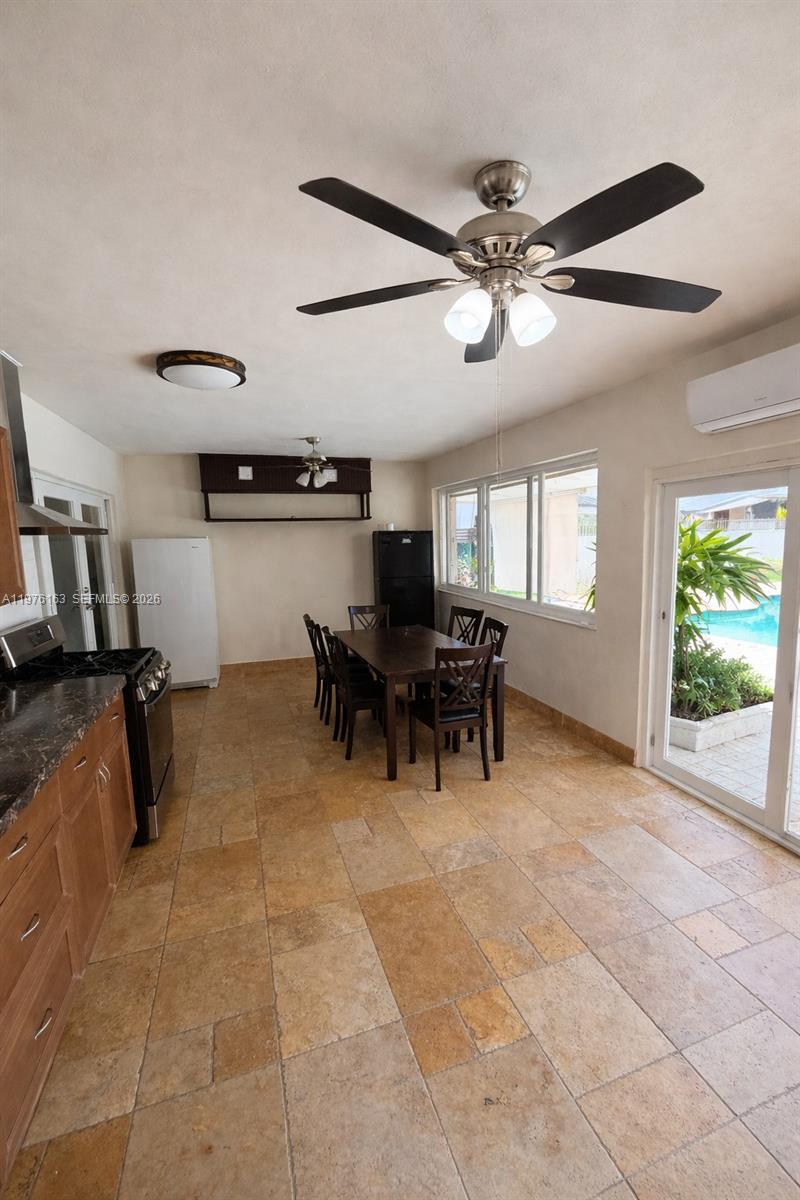 3500 Southwest 128th Avenue Miami, FL 33175 - Photo 19 of 27 a view of a livingroom with furniture and a ceiling fan