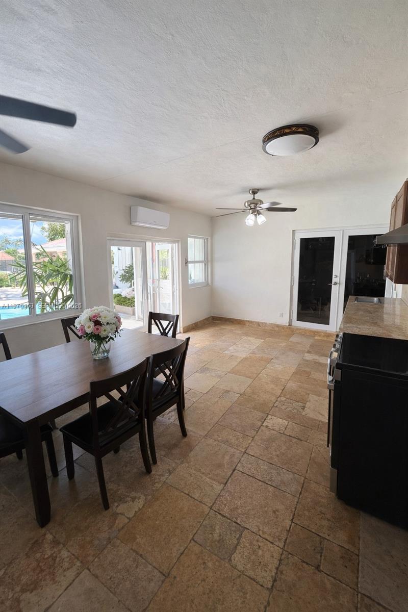 3500 Southwest 128th Avenue Miami, FL 33175 - Photo 20 of 27 a view of a dining room with furniture
