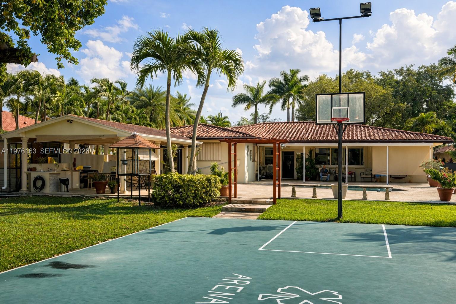 3500 Southwest 128th Avenue Miami, FL 33175 - Photo 3 of 27 a view of a house with a swimming pool