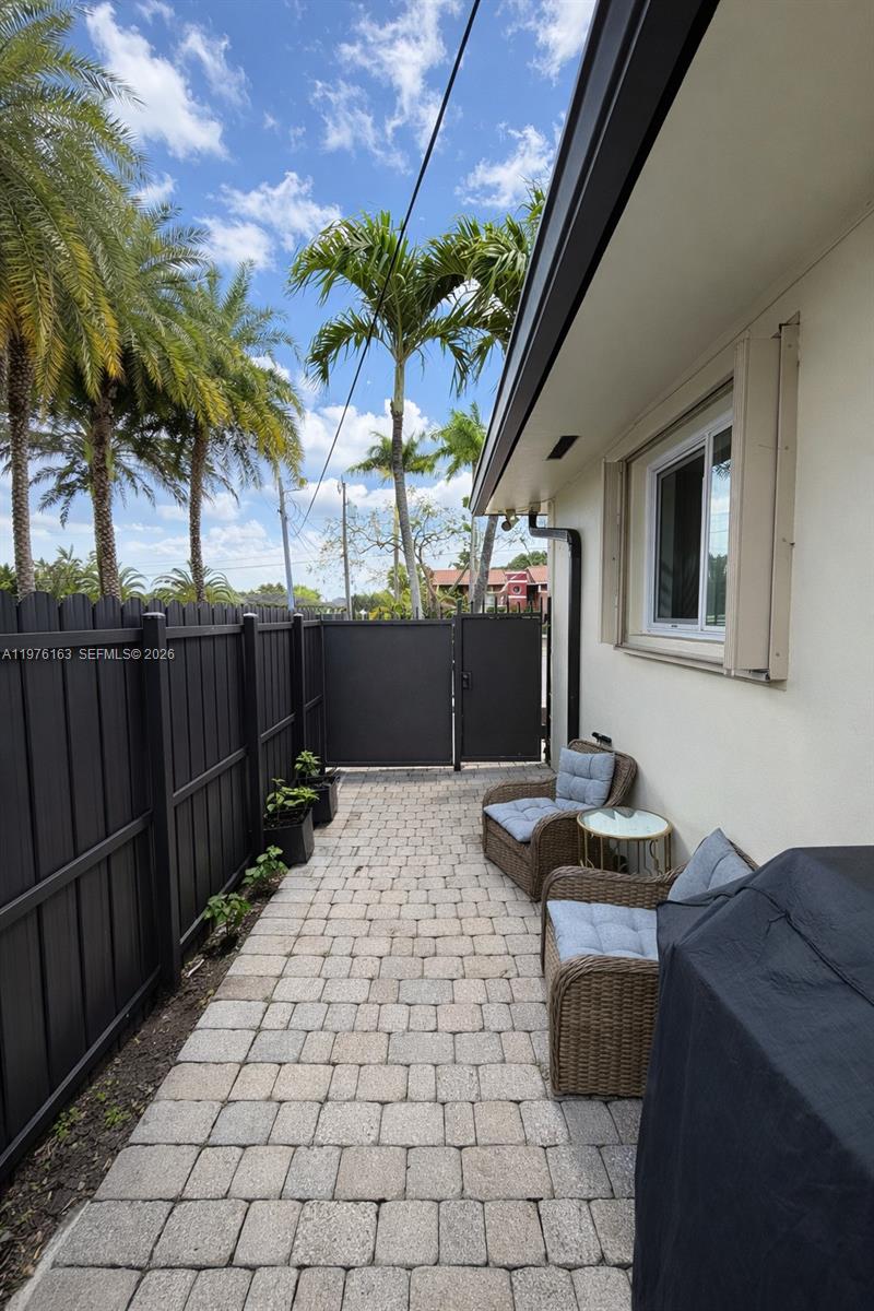 3500 Southwest 128th Avenue Miami, FL 33175 - Photo 4 of 27 a room with furniture and a potted plant