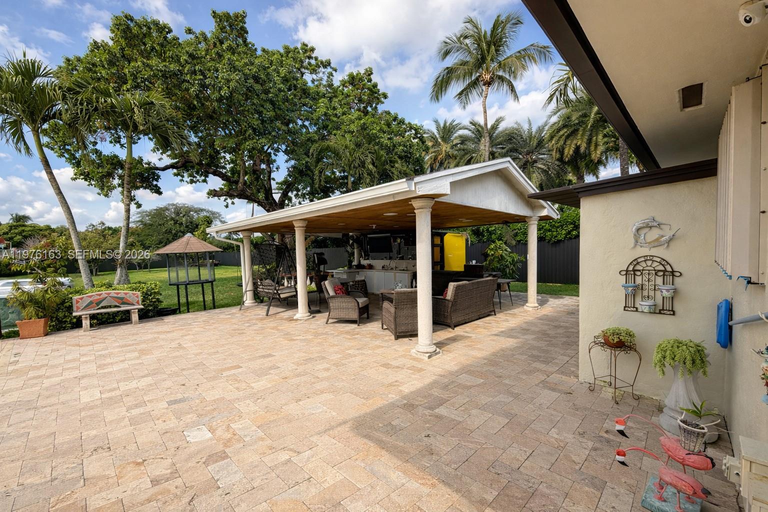 3500 Southwest 128th Avenue Miami, FL 33175 - Photo 9 of 27 a view of a house with backyard porch and sitting area
