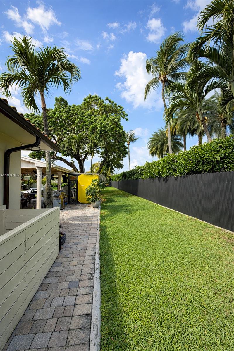 3500 Southwest 128th Avenue Miami, FL 33175 - Photo 10 of 27 a view of a yard with plants and a fountain