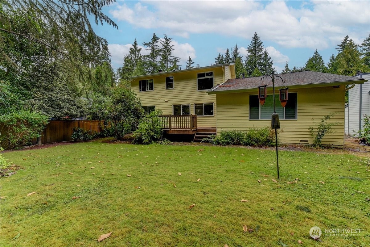 10451 Northeast 204th Place Bothell, WA 98011 - Photo 39 of 40 a view of a house with a backyard
