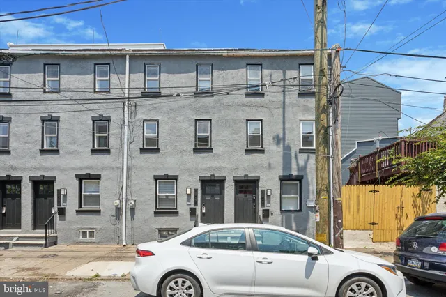 a car parked in front of a building
